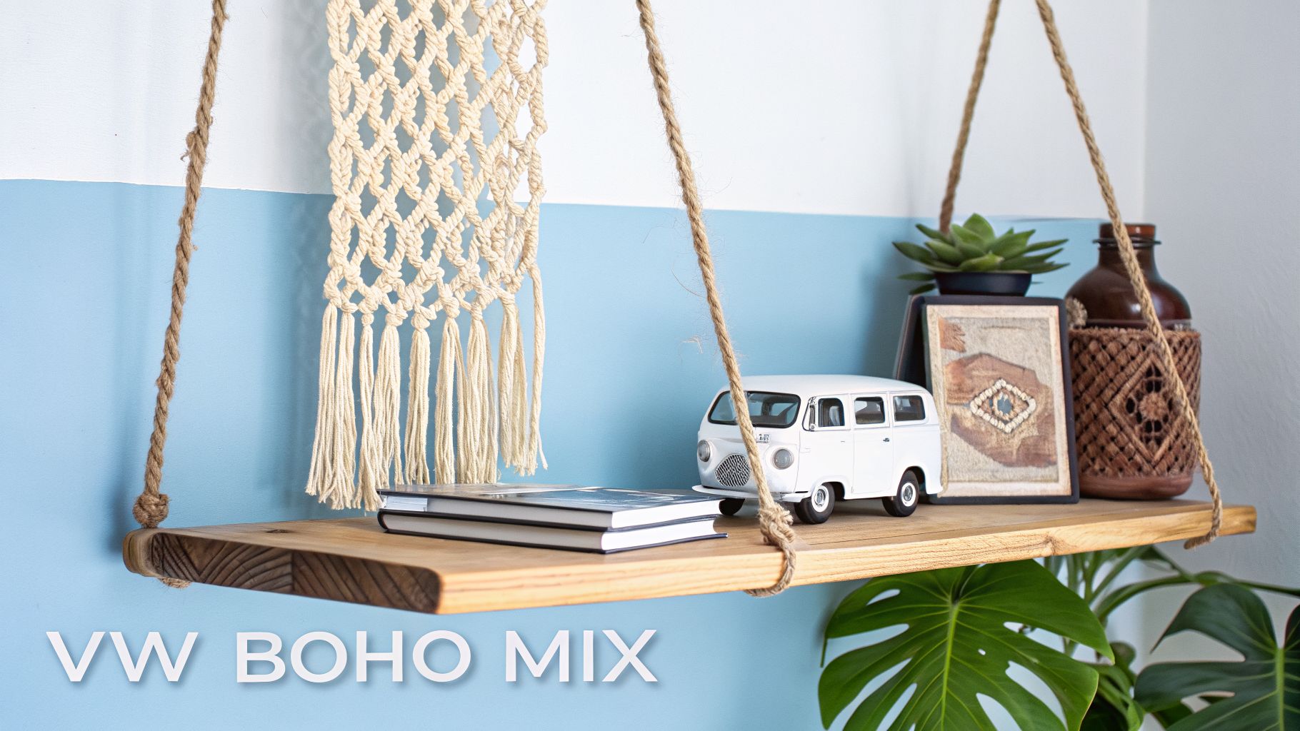 A wooden hanging shelf displays a white toy VW bus, books, a succulent, and boho decor.