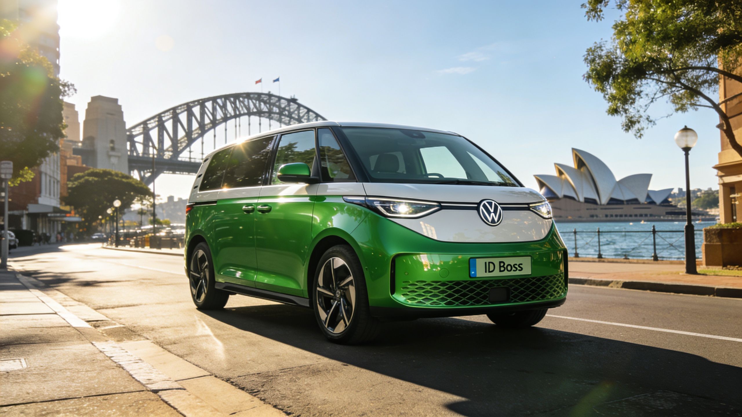 A green and white Volkswagen ID. Buzz van driving on a road near the Sydney Opera House.
