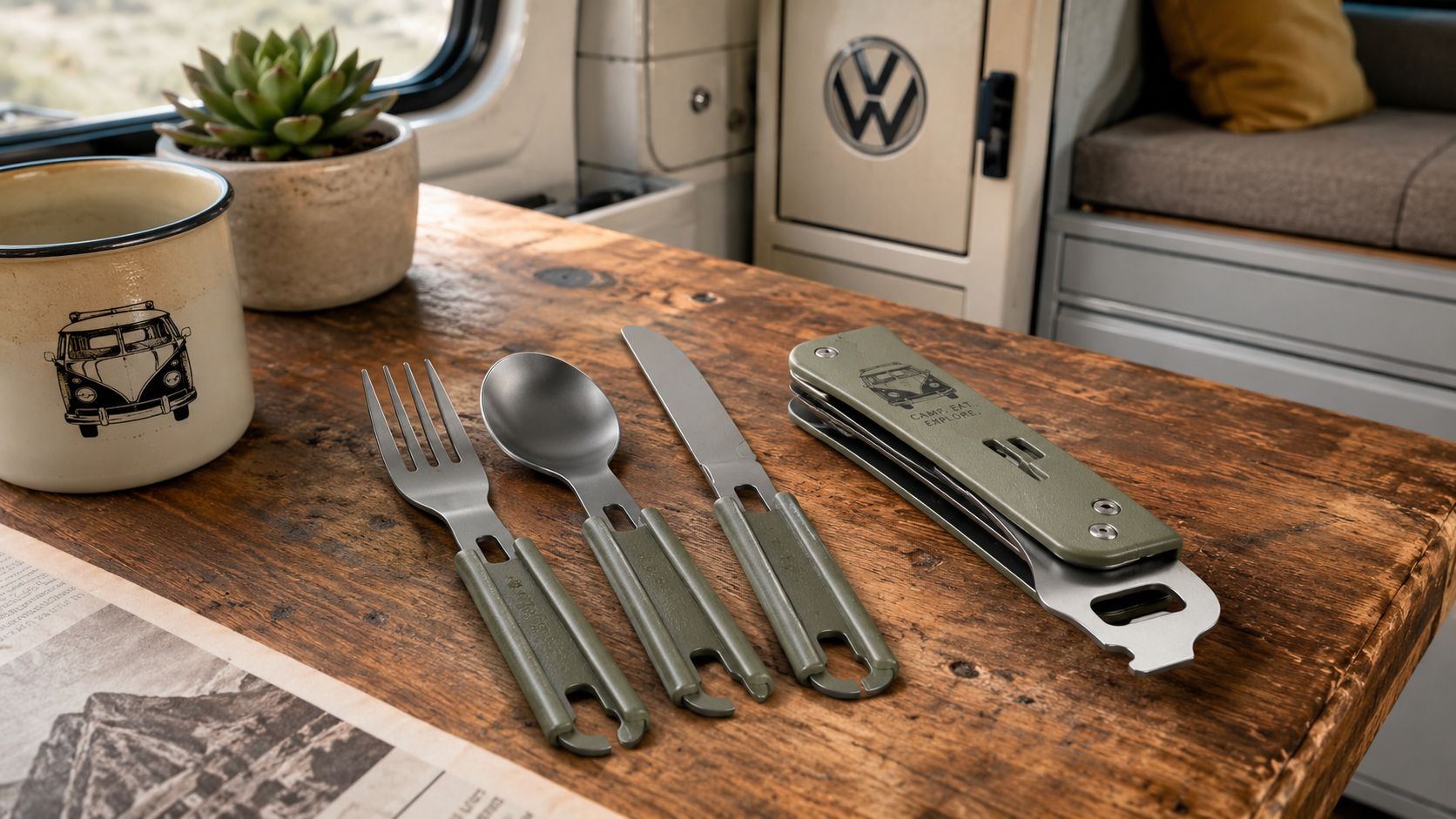A camping utensil set featuring a fork, spoon, knife, and multi-tool on a rustic wooden table inside a van.