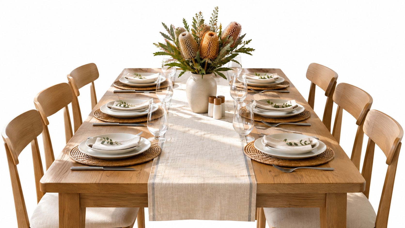A wooden dining table set for six with a linen table runner and rattan placemats