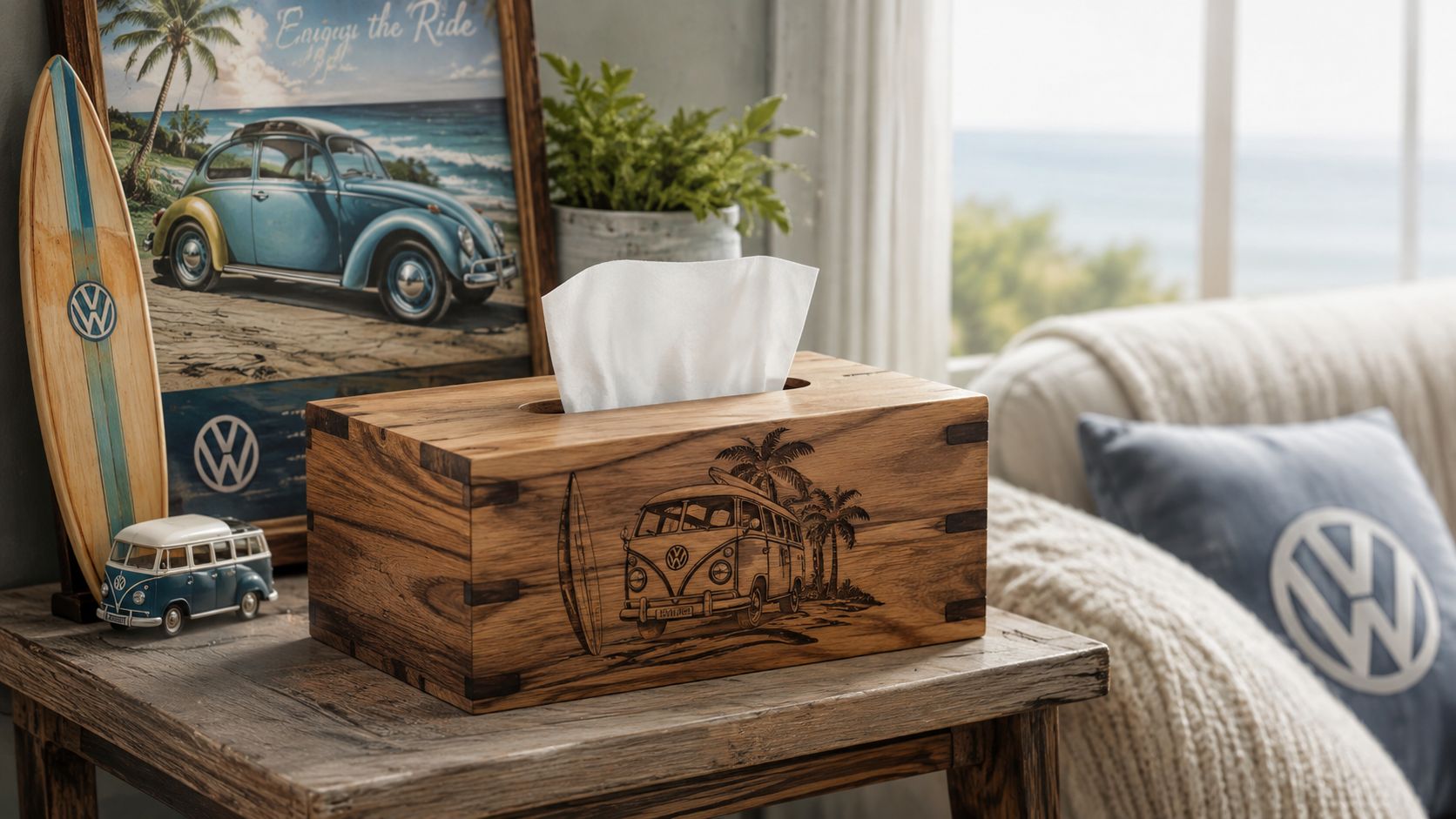 A rustic wooden tissue box cover featuring a Volkswagen van and surfboard engraving on a side table.